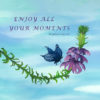 Enjoy All Your Moments Print is a quote from Meghan Currie at the end of one of her yoga classes. The image is of a butterfly and a flower with a light blue background