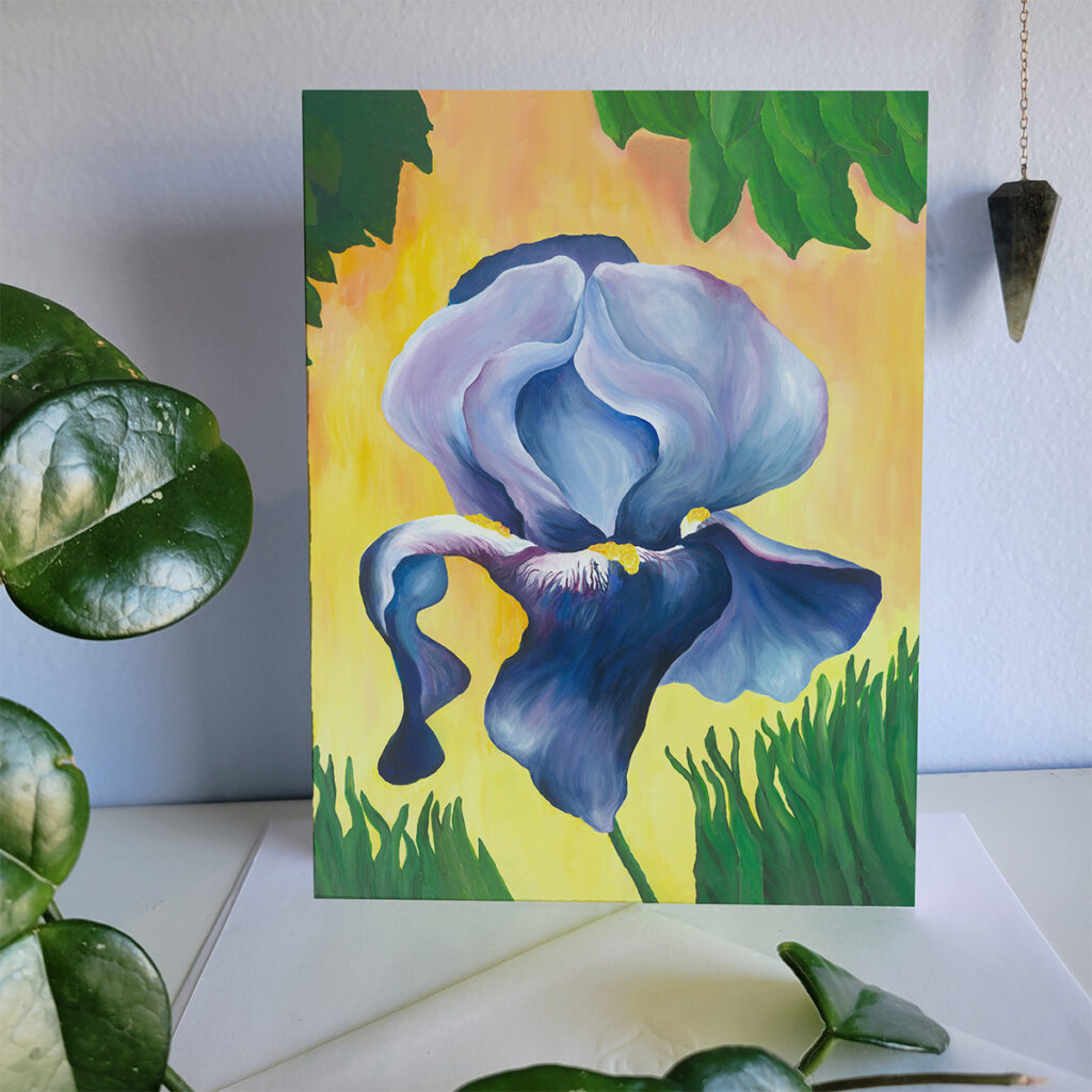 Single Blue Iris on a golden yellow background.