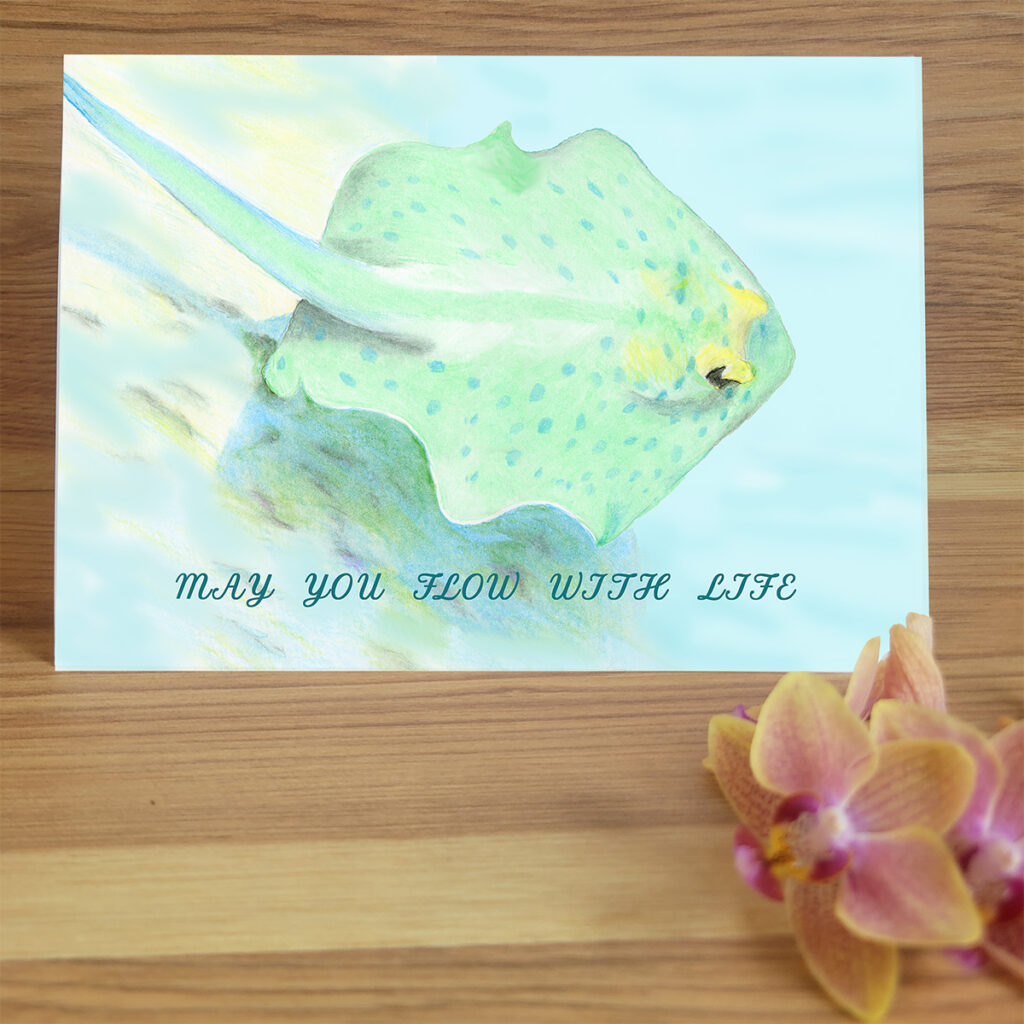 Hand drawn round fish swimming. Text "May You Flow with Life".